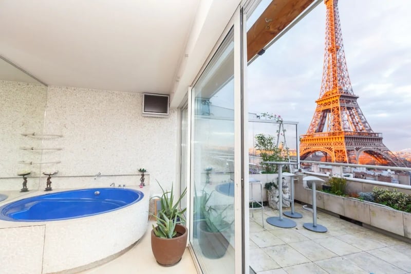 paris airbnb with eiffel tower view and balcony