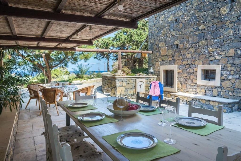 Courtyard of a windmill rental in Crete, Greece