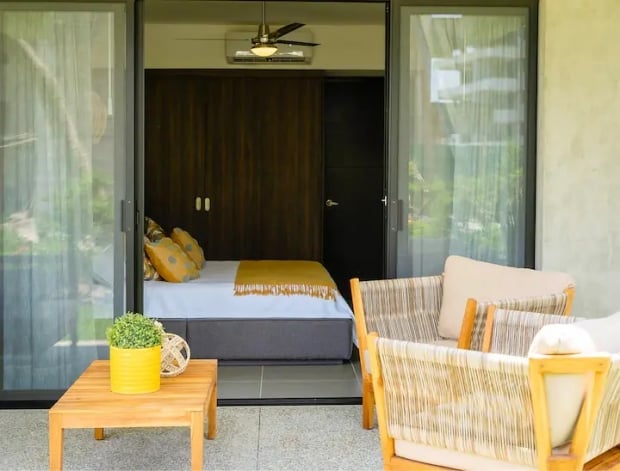 Master bedroom with back garden access of this Nuevo Vallarta Airbnb