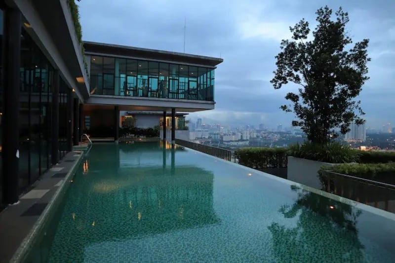 home with infinity pool outside view