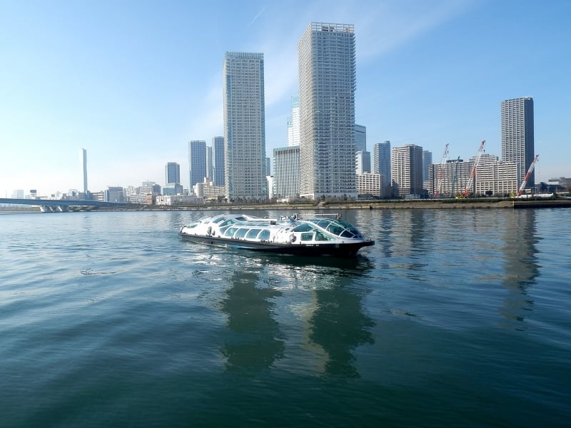 cruise in front of a city skyline in Tokyo