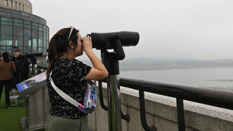 looking into north korea with a pair of binoculars