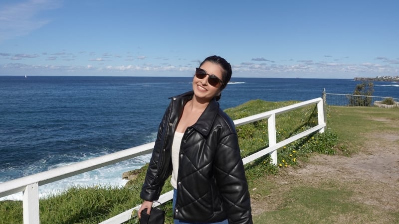 smiling at one of the desginated viewing platforms at clovelly