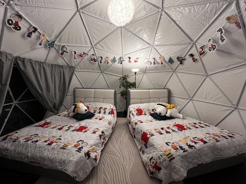 glamping tent with snoopy decor