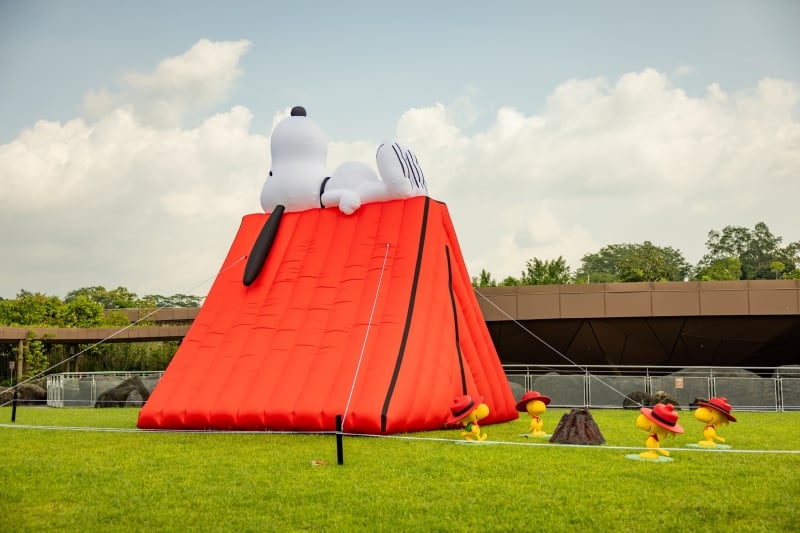 giant tent with snoopy lying on top of it