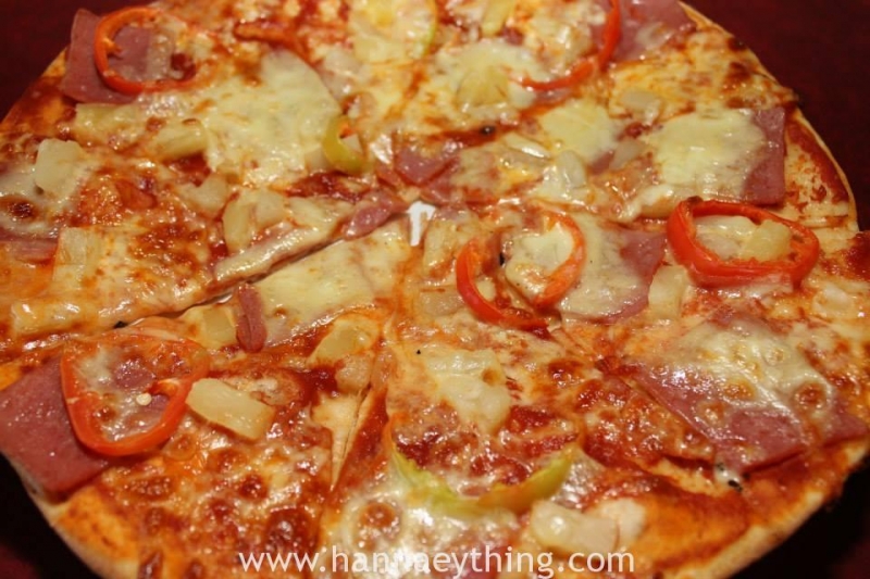 Family-sized pizza in Bodo's Bamboo Bad Resort in Alcoy, Cebu