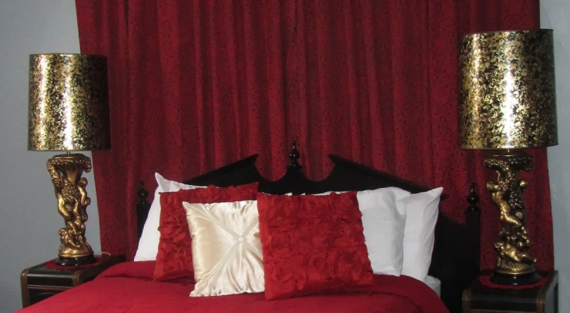 halloween airbnb secluded red mansion bed