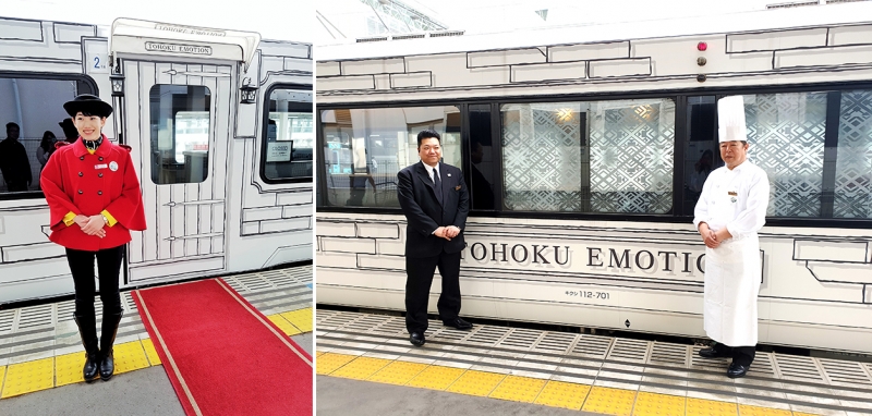 train staff welcoming passengers