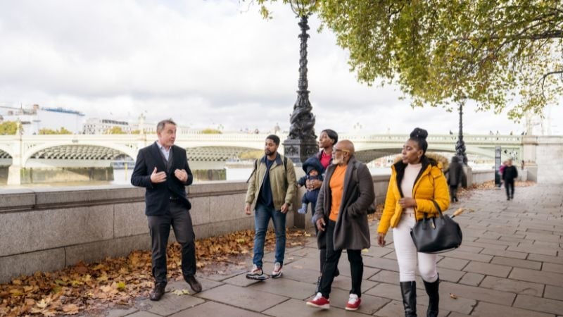 tour guide giving a walking tour in London