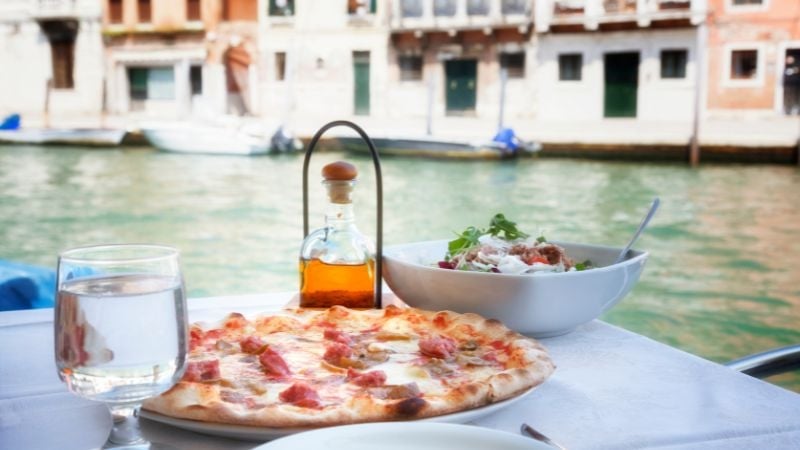 having a european meal by the river