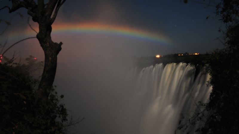 rainbow from moonlight at Victoria Falls