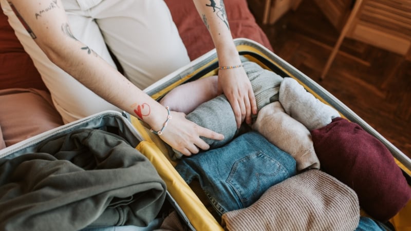 packing a luggage bag for a trip