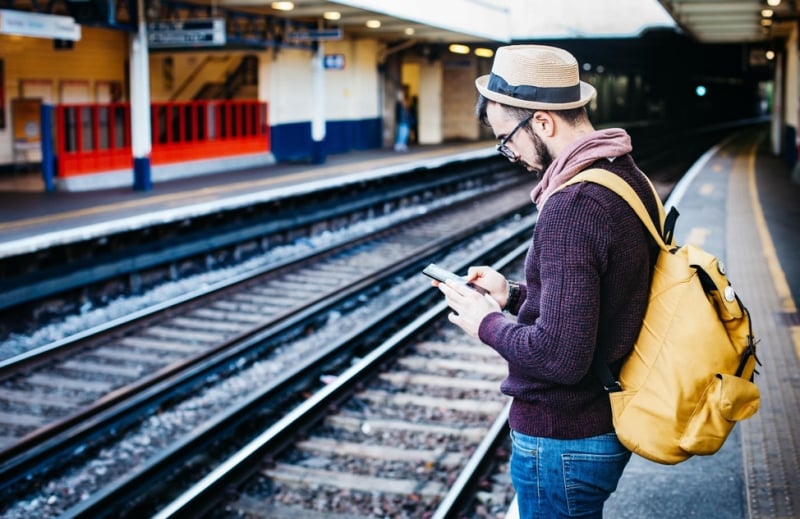 Traveller using phone