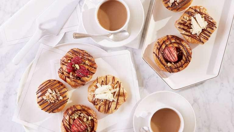 flat lay shot of desserts, coffee and tea