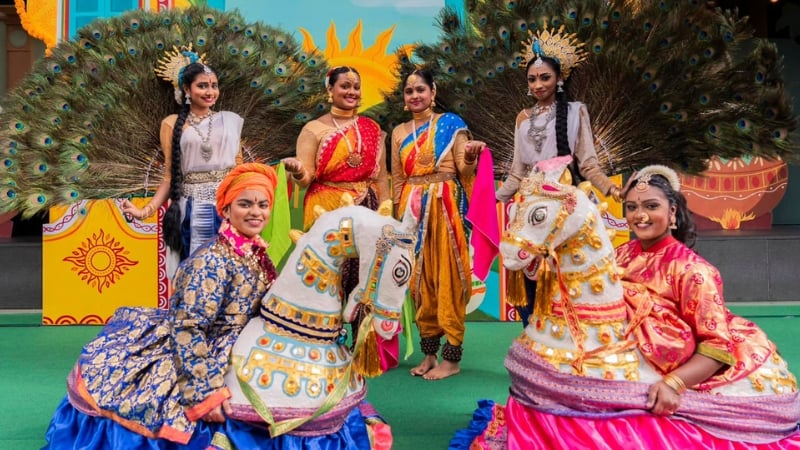 indian dancers in traditional costumes