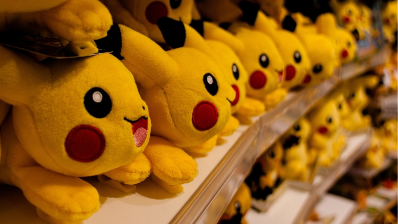 Pikachu stuffed toys on a shelf