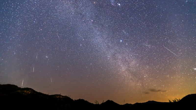 geminids meteor shower in the evening sky landscape