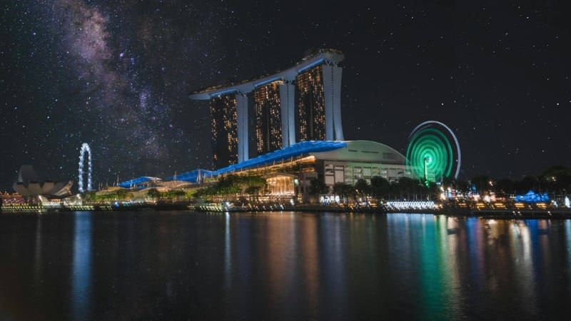 marina bay, singapore, set against a backdrop of stars