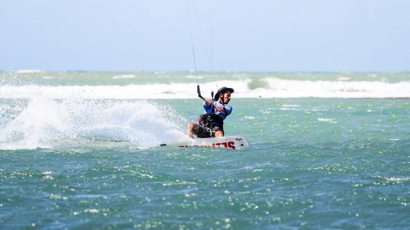 a man kitesurfing