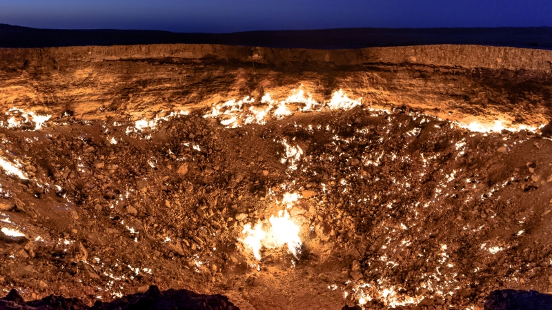 closeup of the crater at the gates of hell in turkmenistan