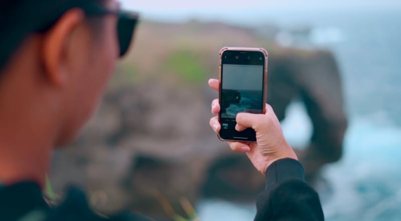 Taking a photo of the 'elephant' at Cape Manzamo