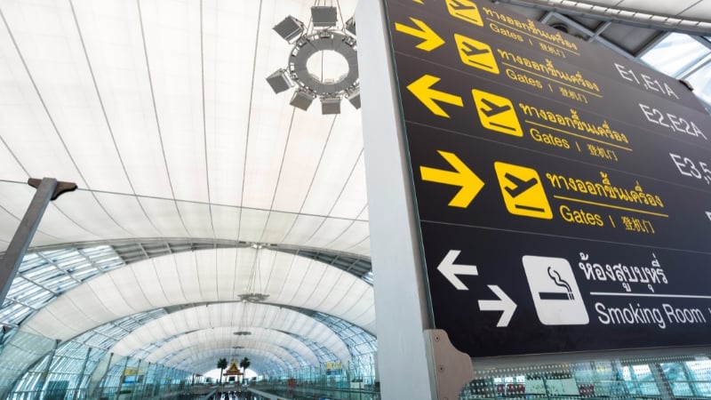 bangkok airport sign, with gates for flights