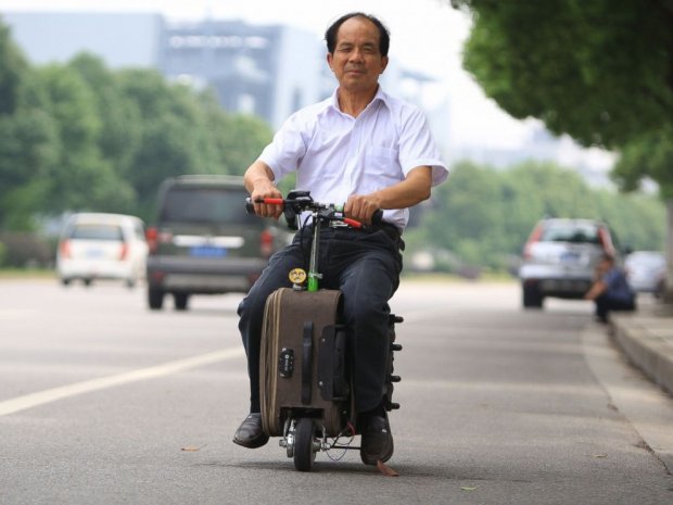 Motorised scooter suitcase