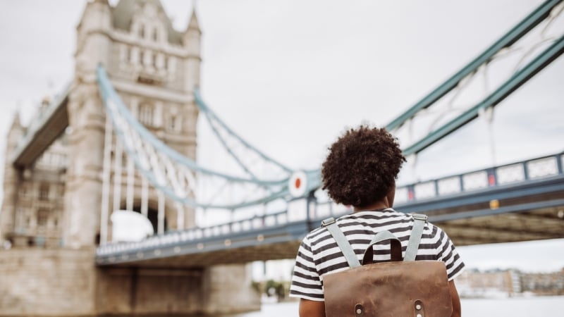 solo traveller at the tower bridge in london, england