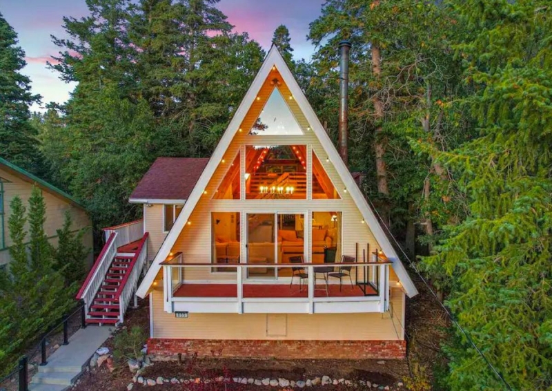 a-frame cabin with pretty lights