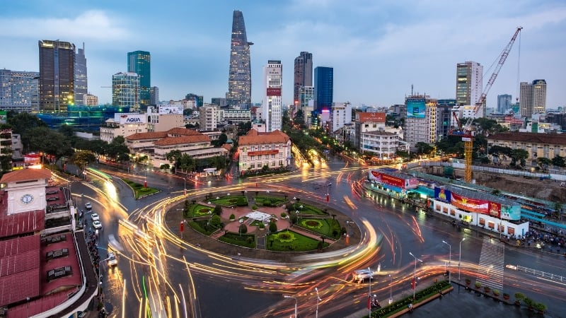 a busy traffic roundabout in ho chi minh city